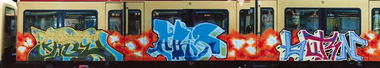 Graffiti Train - Photo by ALLESdrehtSICH - face, ads, abis
