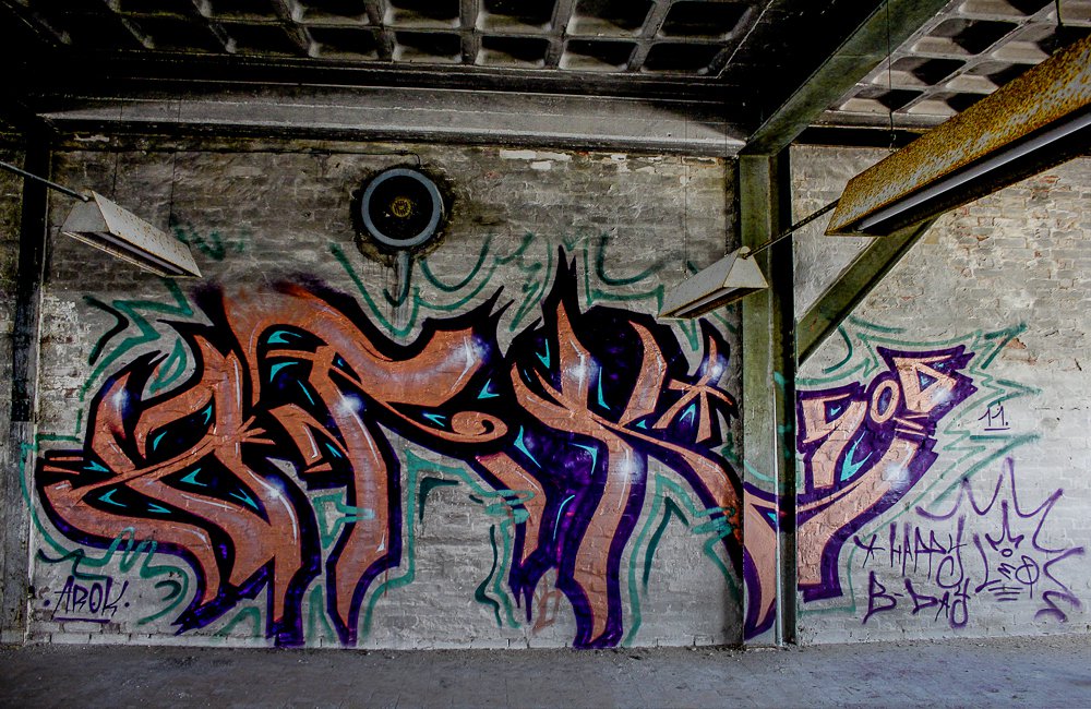 Graffiti Wall - Photo by AROK - AROK, SOG, HAPPY (2011)