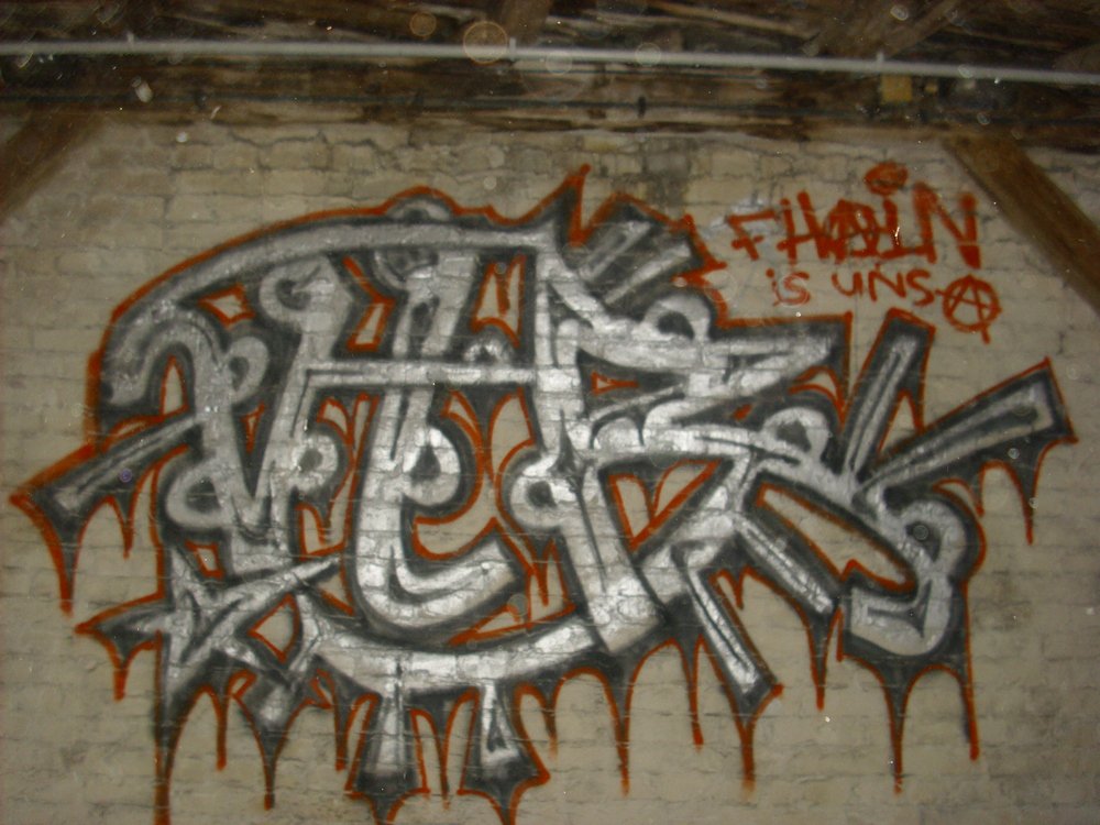 Graffiti Wall in Berlin - Photo by ASTRAINER