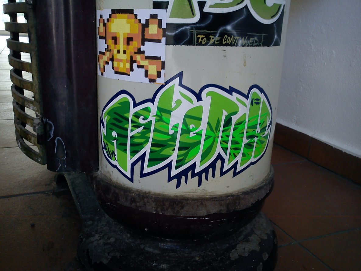 Graffiti Street Art in Zilina - Photo by Asteriks - sticker, asterix, abiotik (2011)