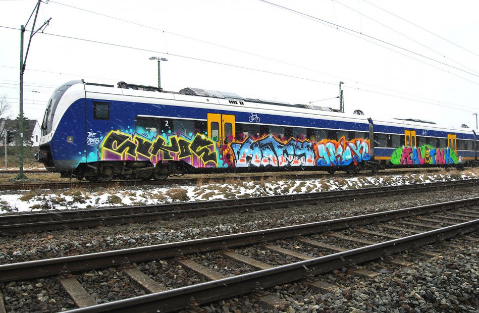 Graffiti Train in bremen - Photo by Bigchill - sukoe, howy, niek (2013)