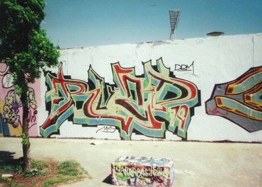 Graffiti Wall in Berlin - Photo by COLLECTOR - Ruzd, DRM, MIS (2001)