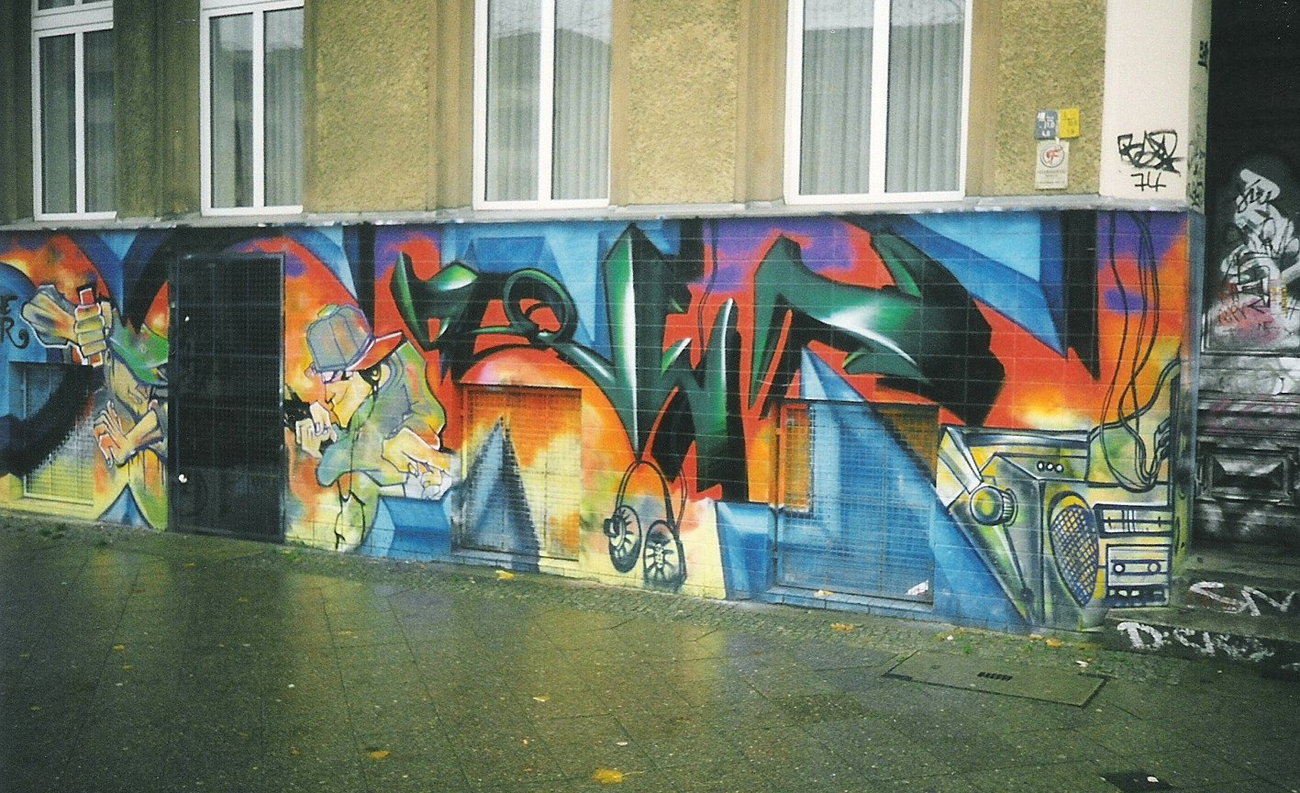 Graffiti Wall in Berlin - Photo by COLLECTOR - Downstairs, Berlin