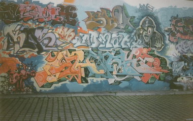Graffiti Wall in Berlin - Photo by COLLECTOR - Kos, BMQ, Berlin (1995)