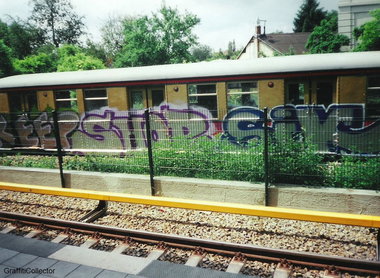 Graffiti Train in Berlin - Photo by COLLECTOR - Shop, Sik, Berlin (2001)