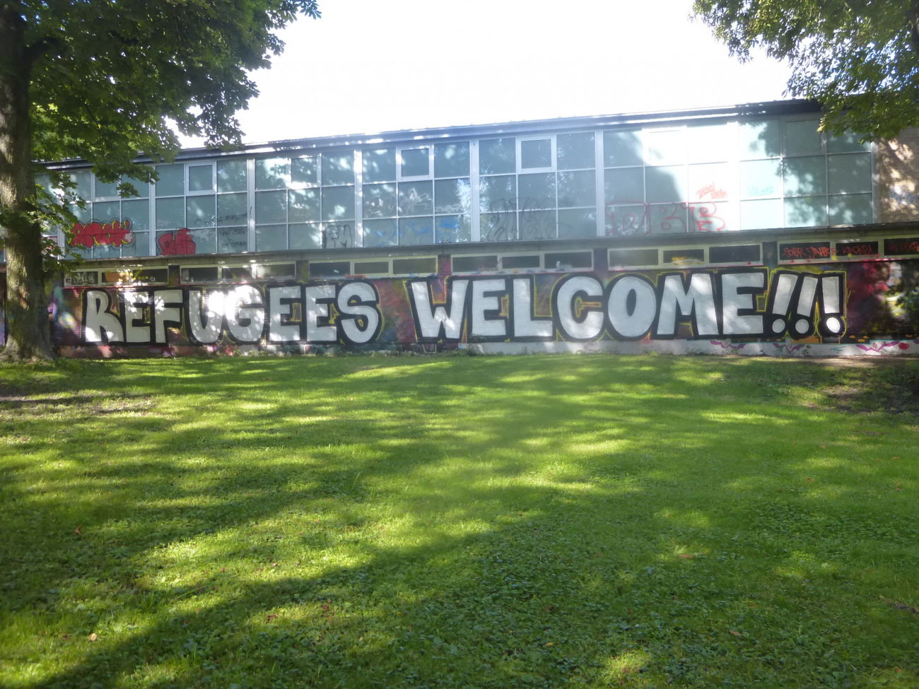 Graffiti Wall - Photo by Candyflip - antifa, refugees, welcome (2015)