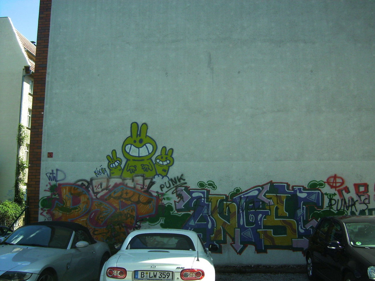 Graffiti Wall in Berlin  - Photo by Chintz
