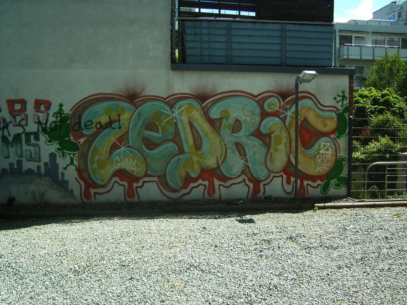 Graffiti Wall in Berlin  - Photo by Chintz