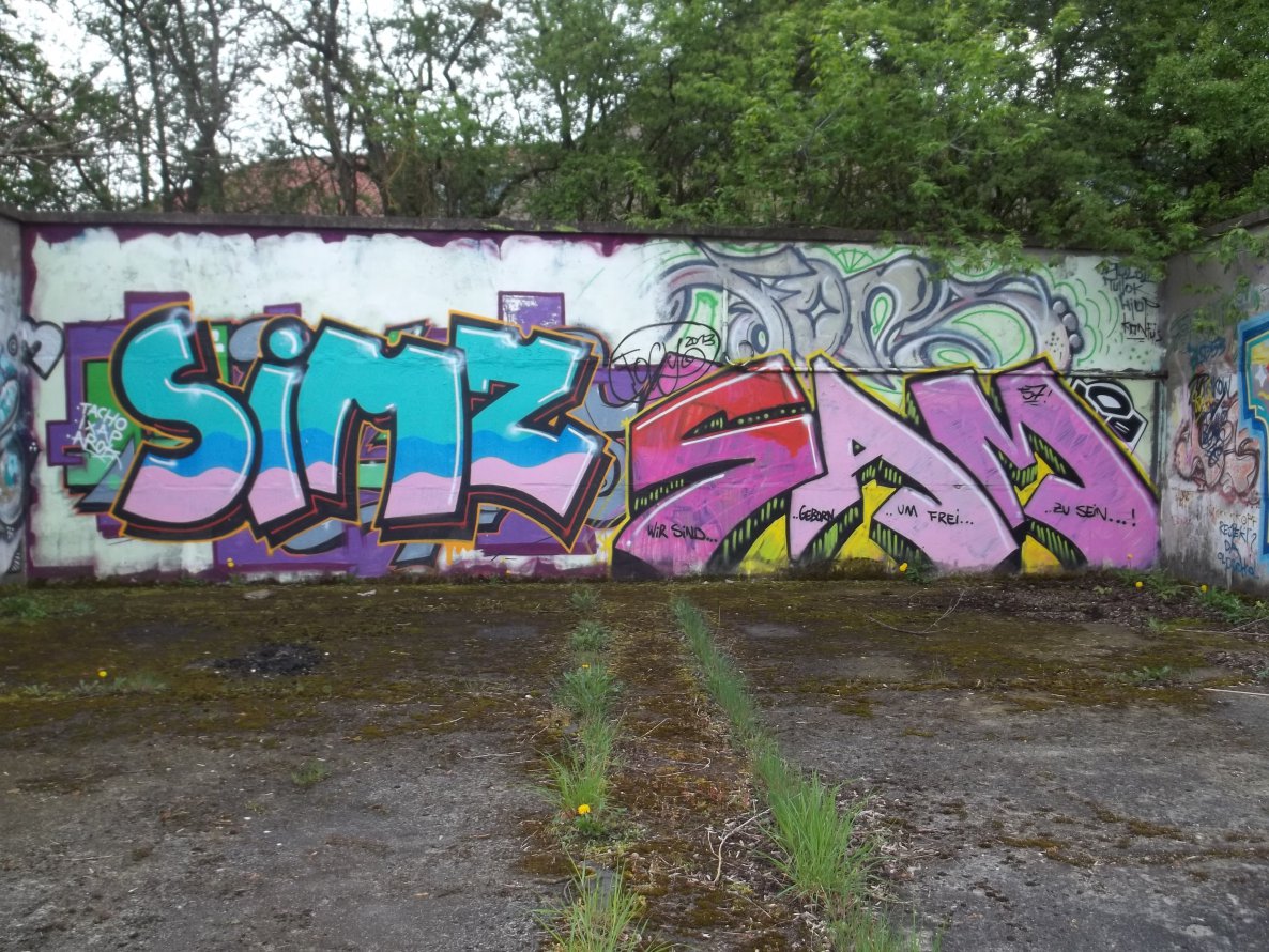 Graffiti Wall - Photo by Coma31 - SIMZ, SAM