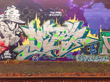 Graffiti Wall - Photo by DETS - silver, bullet (2013)