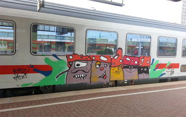 Graffiti Train - Photo by Dauer_Welle - Ratzi, Fatzi