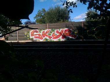 Graffiti Wall - Photo by DerKoeter - skyr, ra, crew (2015)