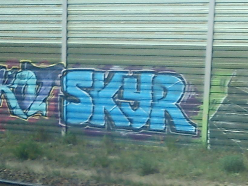 Graffiti Wall - Photo by DerKoeter - skyr, ra, crew