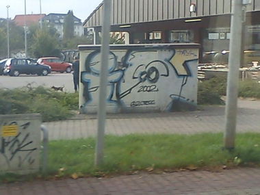 Graffiti Bombing - Photo by DerKoeter - iq, magdeburg (2002)