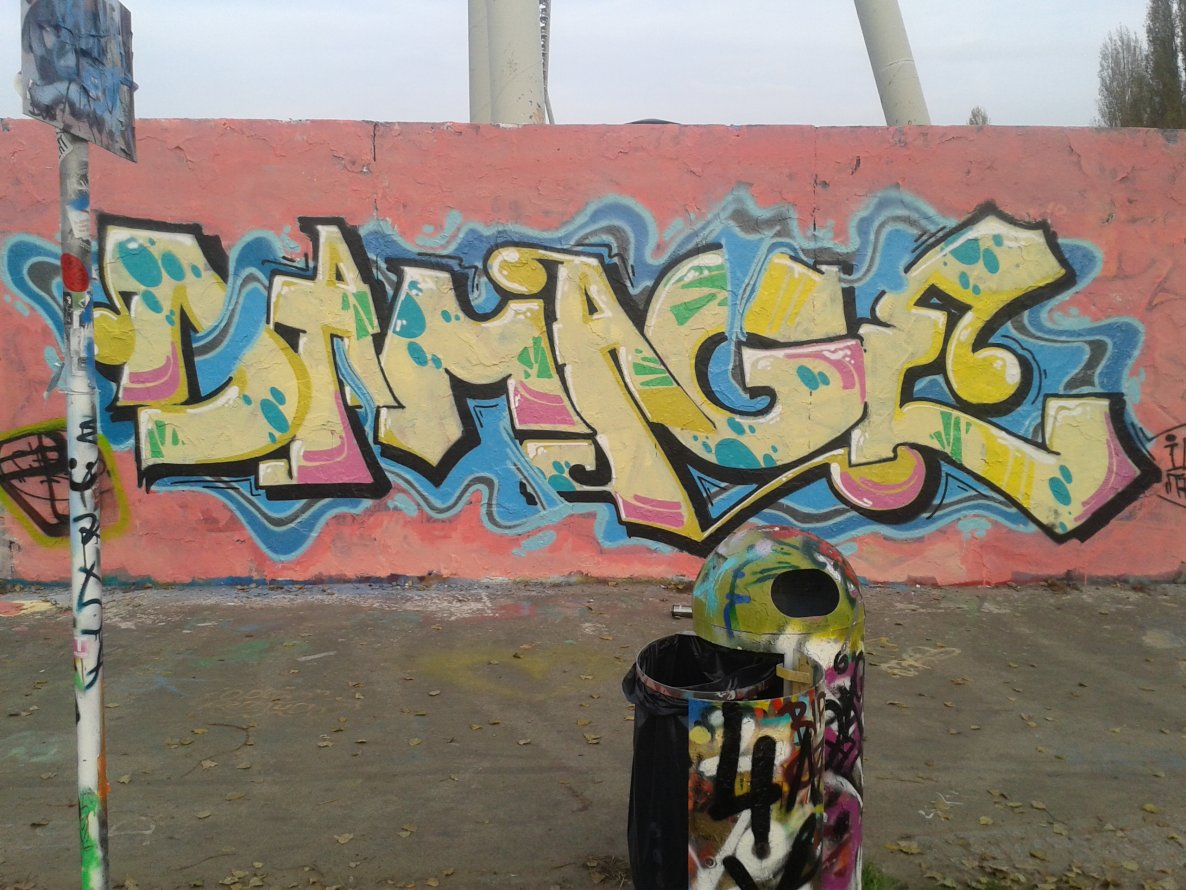 Graffiti Wall - Photo by Diggidi - Damage