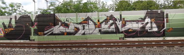 Graffiti Bombing - Photo by Dorfseufer69 - MORE, MORE, MORE