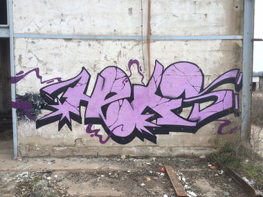 Graffiti Bombing - Photo by ENOD8 - Heks