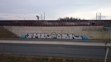 Graffiti Bombing - Photo by Farbmalclub