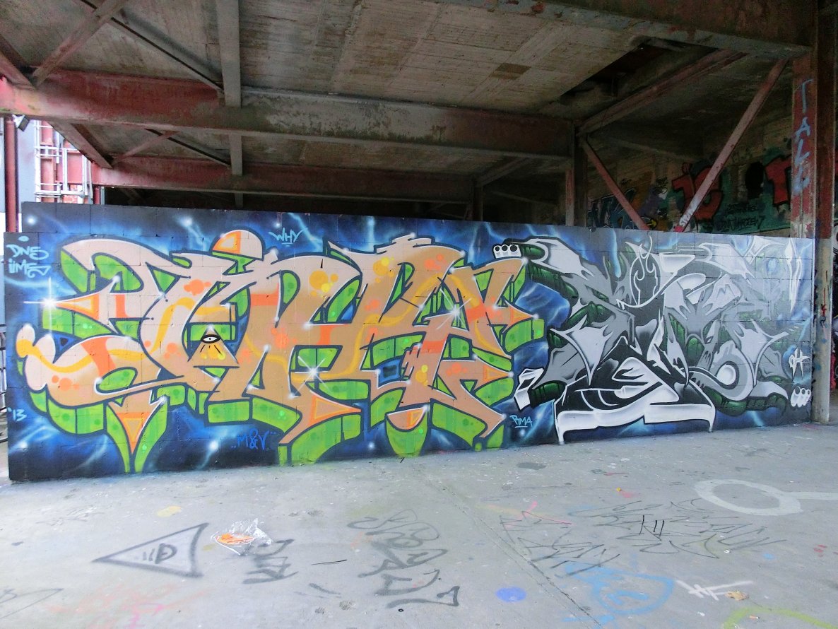 Graffiti Wall in Berlin - Photo by Frame - Why, Sime, OH (2013)