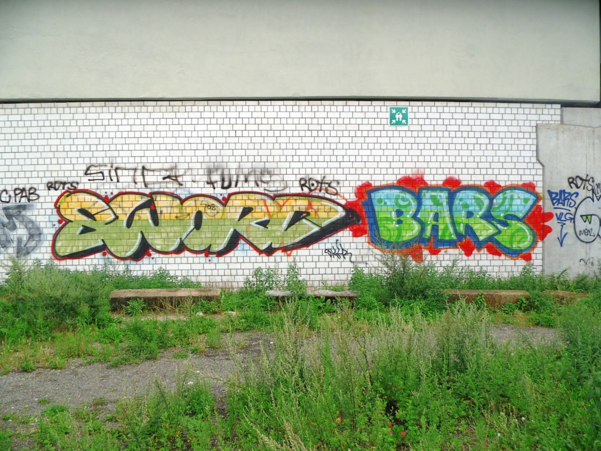 Graffiti Wall - Photo by GBBI - sword, bars, berlin