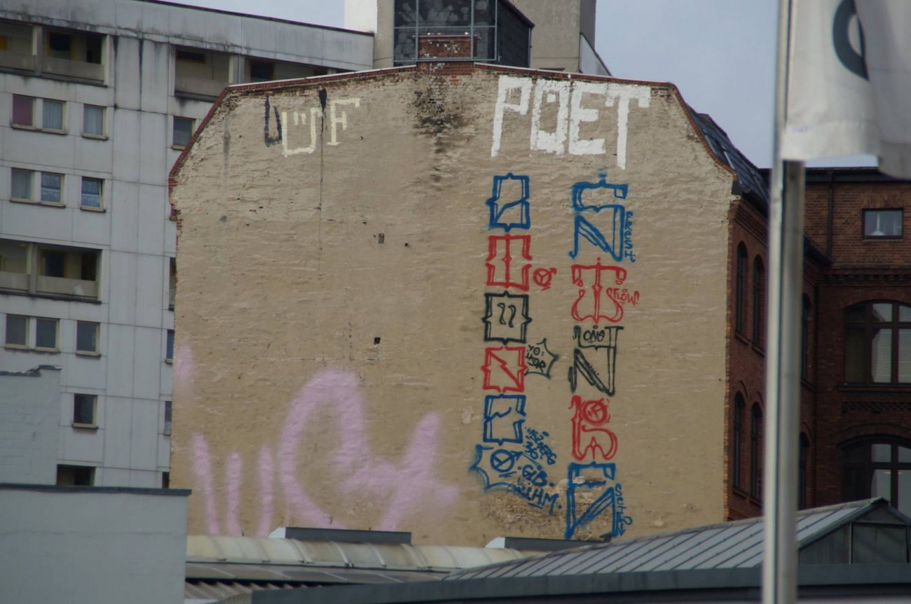 Graffiti Wall - Photo by GBBI - üf, poet, just
