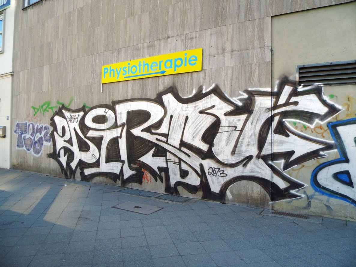 Graffiti Bombing - Photo by GBBI - dirty, bc