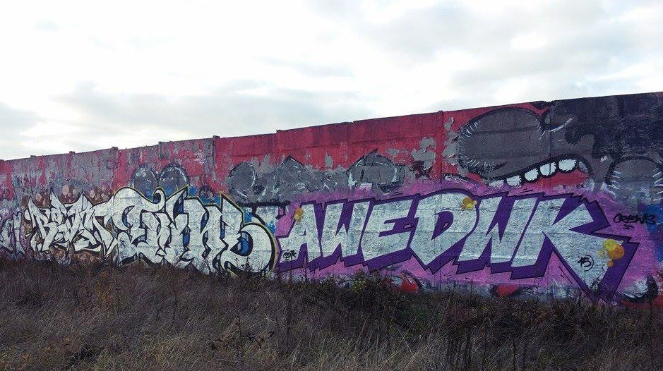 Graffiti Wall - Photo by GerdemGerdem - boast, tribal