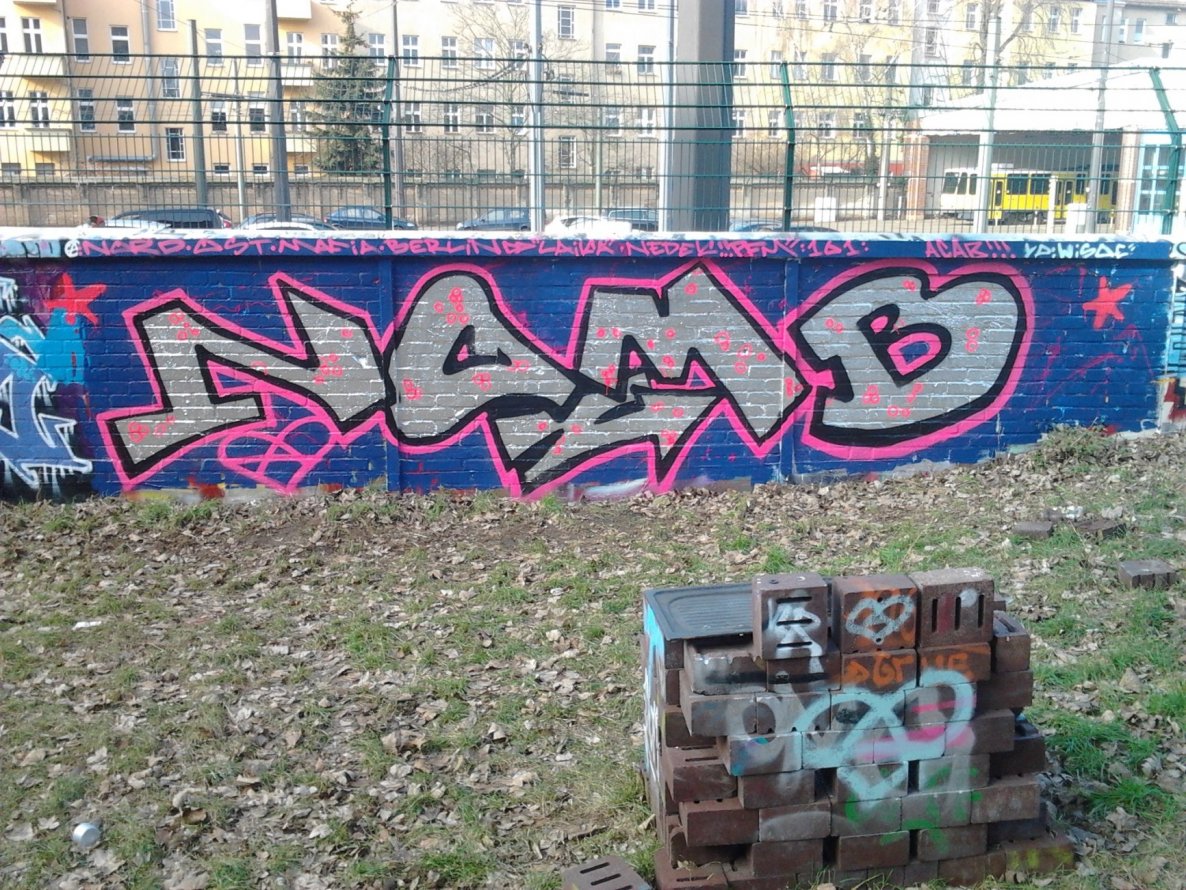 Graffiti Wall in Berlin - Photo by Hauswart1120 - NOMB, LAIKA, NEDEK (2015)