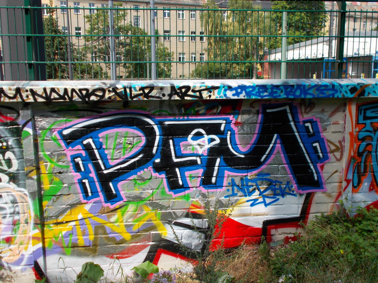 Graffiti Wall in Berlin - Photo by Hauswart1120 - PFM, NEDEK, FREE (2015)