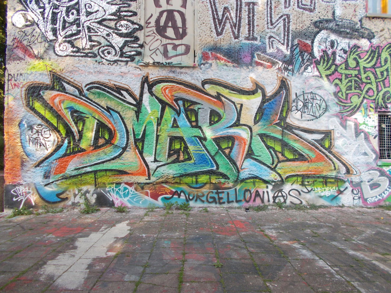 Graffiti Wall in Berlin - Photo by Hauswart1120 - DAMRK, DFG, NTFW (2015)