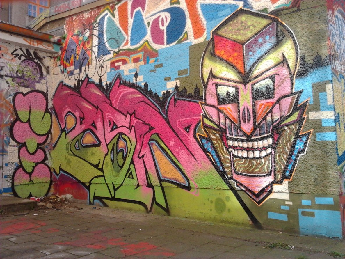 Graffiti Wall in Berlin - Photo by Hauswart1120 - ASIN, NTFW, DMARK (2015)