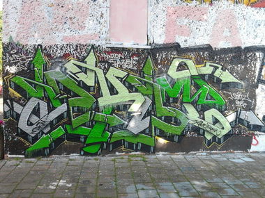 Graffiti Wall in Berlin - Photo by Hauswart1120 - DKM, GREY, GRAY