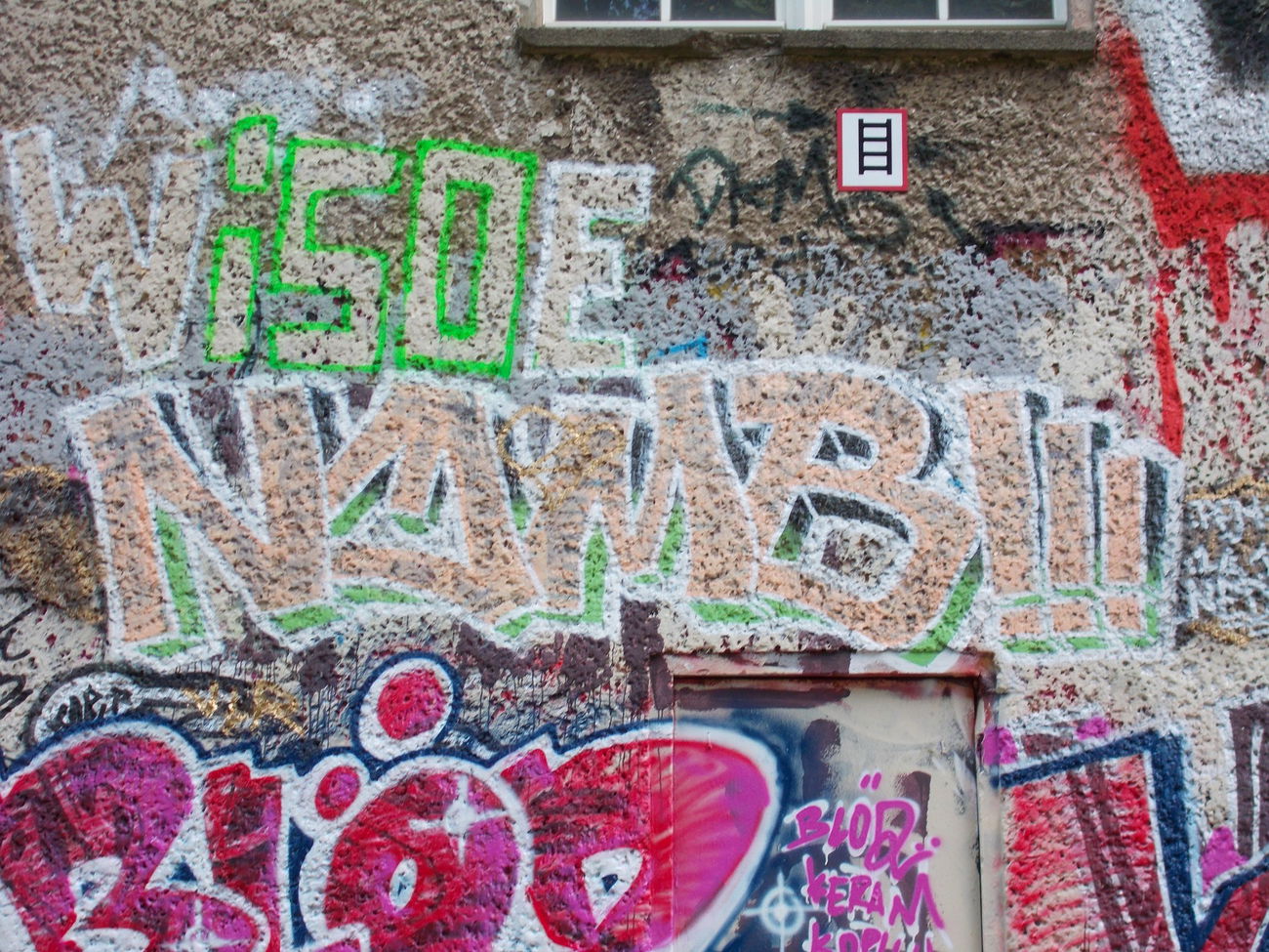 Graffiti Wall in Berlin - Photo by Hauswart1120 - NOMB, NEDEK (2015)