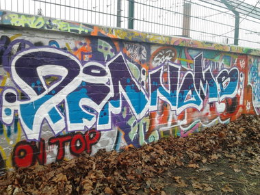 Graffiti Wall in Berlin - Photo by Hauswart1120 - PFM, NOMB, NEDEK (2015)