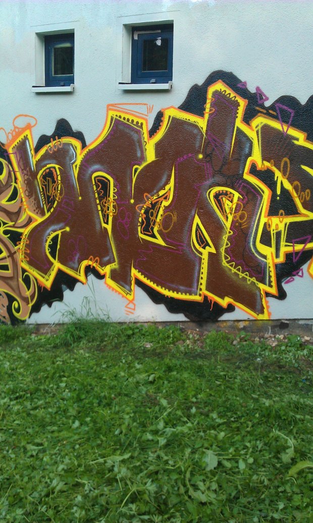 Graffiti Wall - Photo by JAMAL - snok, znok (2014)