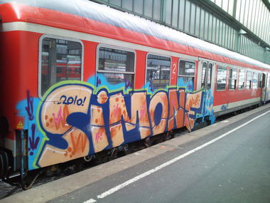 Graffiti Train in Stuttgart - Photo by JayHardwood - Sim, one, Simone (2010)