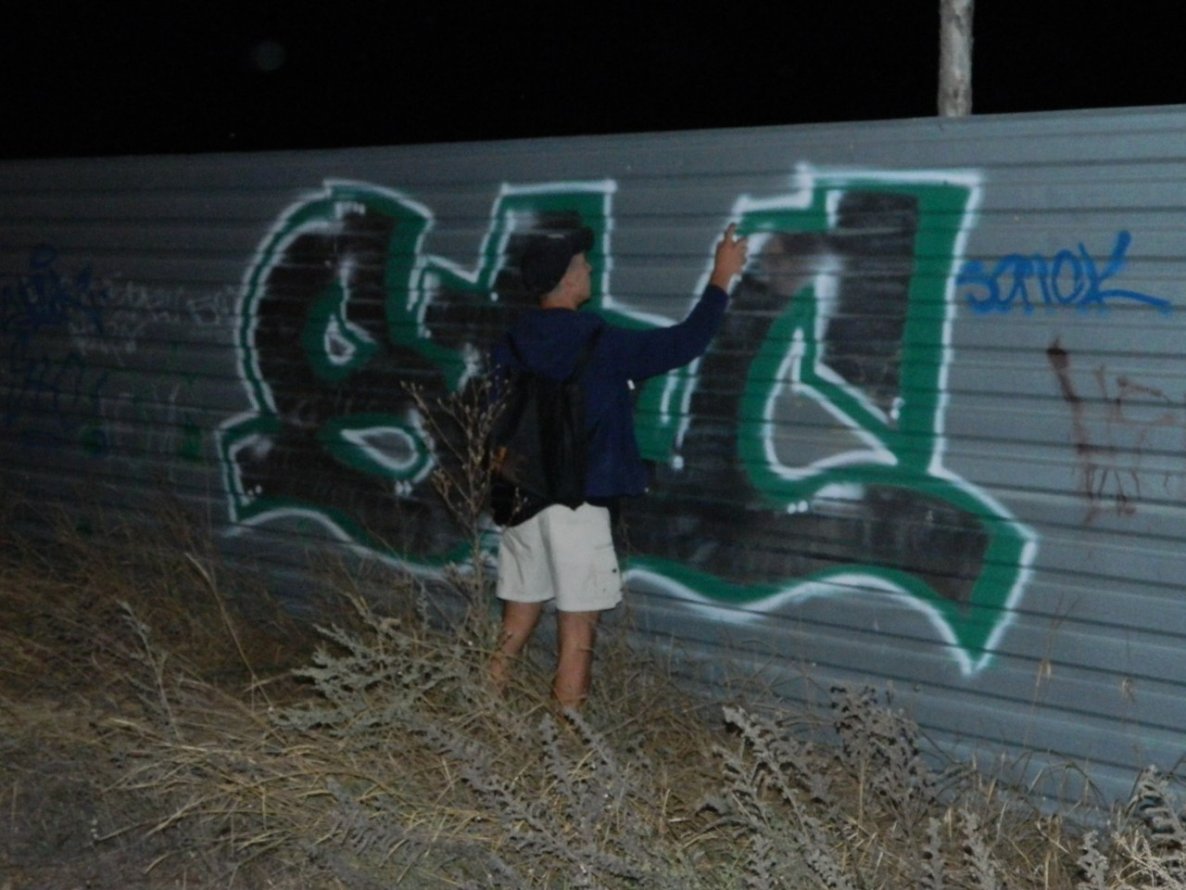 Graffiti Bombing - Photo by JonkMRKJU - Action, Yo, Slok (2014)