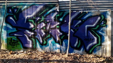 Graffiti Bombing - Photo by Kaesu - kurwa, chuj