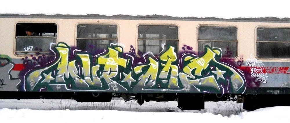 Graffiti Train - Photo by Kaktus - mupok, mupock, speis (2012)