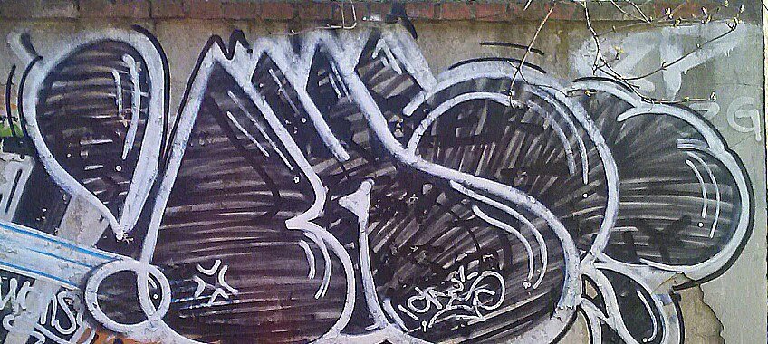 Graffiti Bombing - Photo by KamieCms - cms, kamie, kams