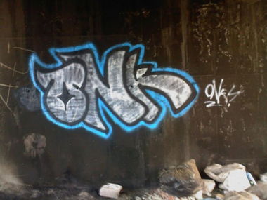 Graffiti Bombing in Izmir - Photo by Karo - bomb, white, blue (2012)