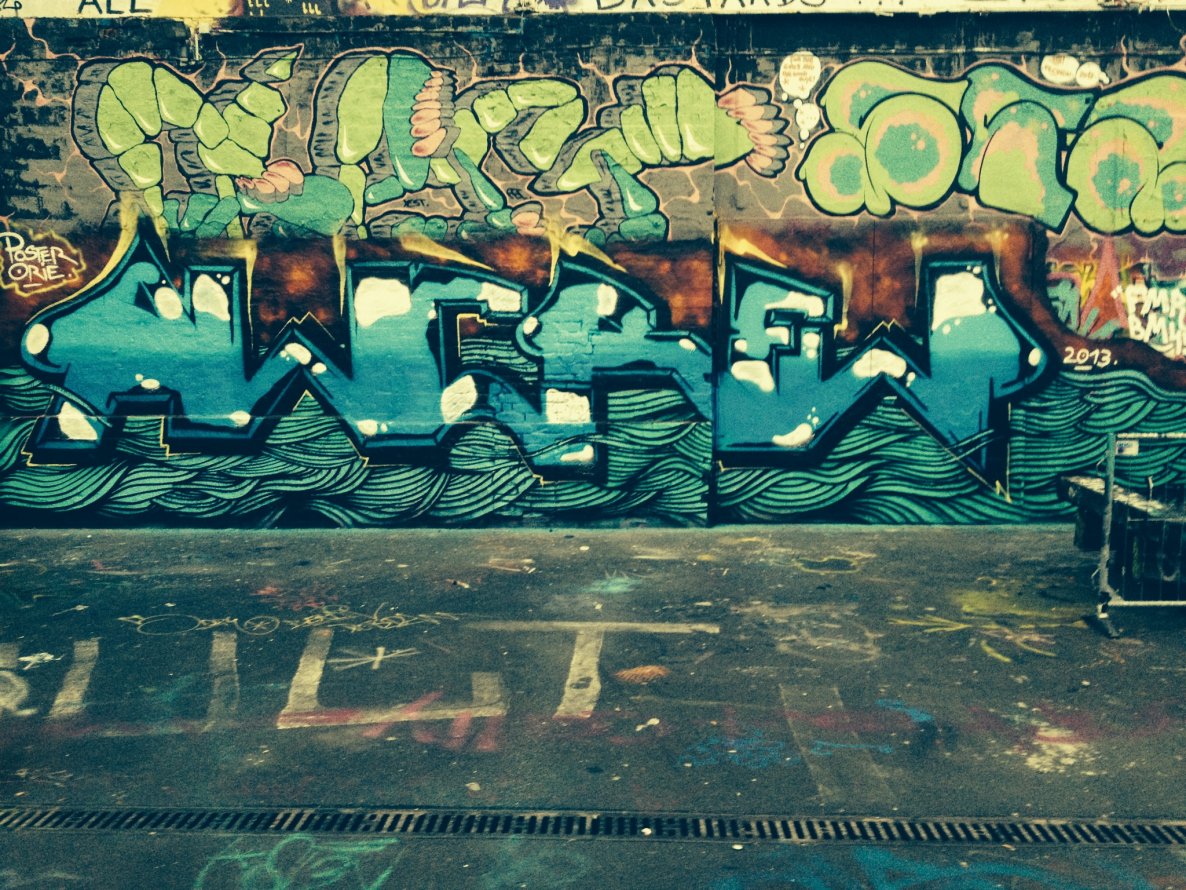 Graffiti Wall in Leipzig - Photo by KlausKinski - awc, poster, orie (2013)