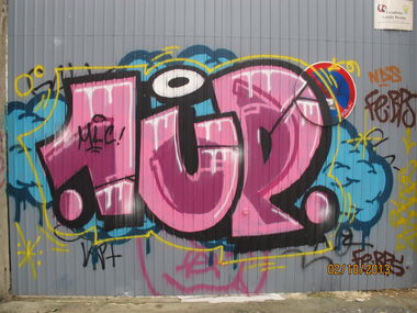 Graffiti Bombing - Photo by LeerMarker - 1UP, One, United