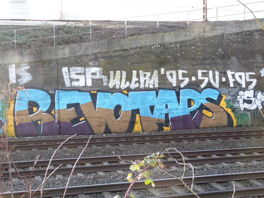 Graffiti Bombing - Photo by Marieundjana - revo, taps