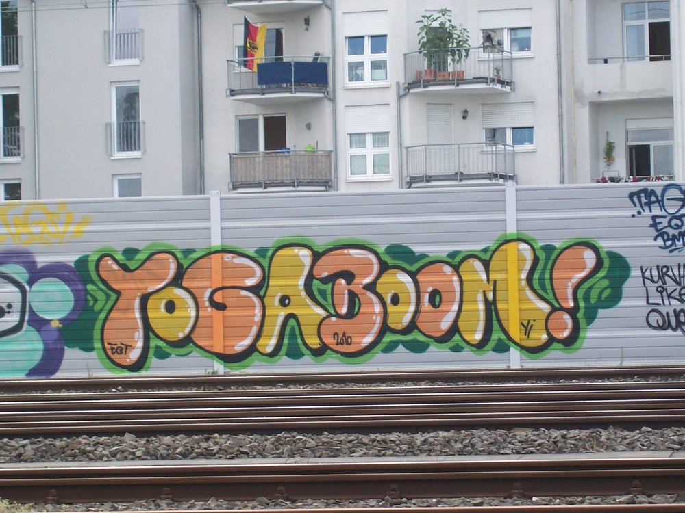 Graffiti Bombing - Photo by Marieundjana - yoga, boom