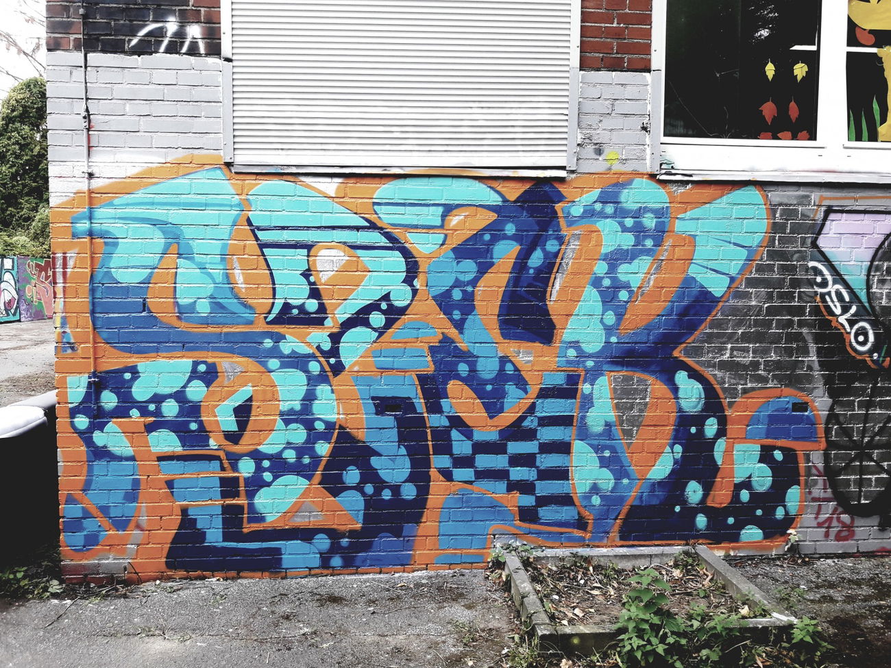 Graffiti Wall - Photo by MettMitZett