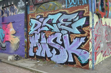 Graffiti Wall - Photo by MisterDiceOne - dice, mask, glocksee