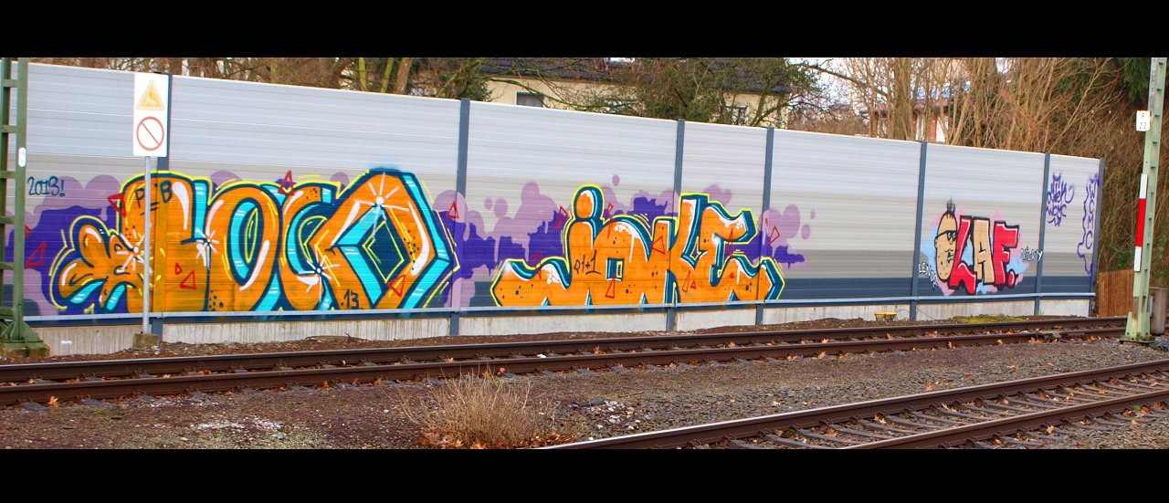 Graffiti Bombing - Photo by Nahrungsmittel - LOCO, JOKE, OLAF (2013)