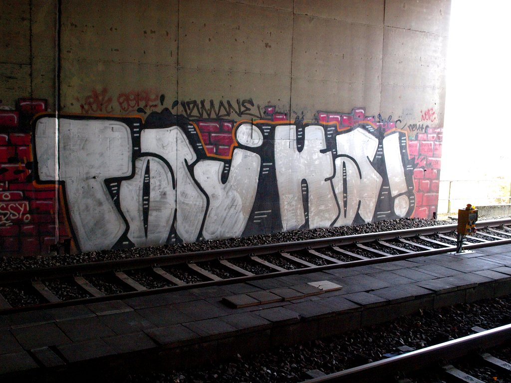 Graffiti Bombing - Photo by Nahrungsmittel - TAJHA, TAJ, HA