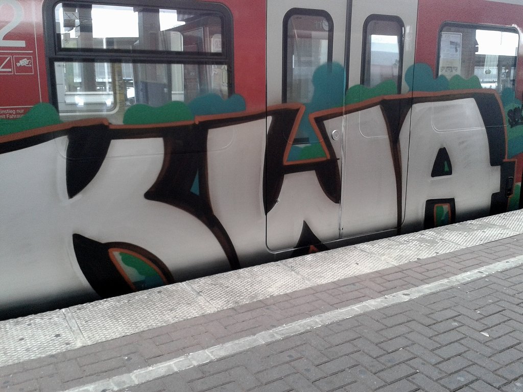Graffiti Train - Photo by Nahrungsmittel - KWA, SCREW, JOKE
